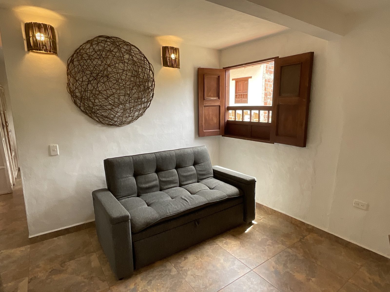 Casa Orago - Sala con sofá cama